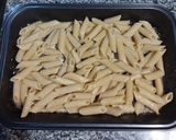 Foto del paso 4 de la receta: Pasta corta con pollo y salsa blanca gratinada