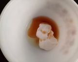 A picture of step 2 of Carrot raisin salad.