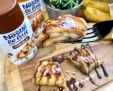 Une image de l'étape 9 de Pâte à crêpes à la Banane (et crêpes fourrés à la banane, topping chocolat, flambée au Rhum blanc).