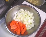 A picture of step 3 of Braised Pork belly and sweet potato with tomato.