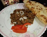 A picture of step 18 of Barb' q dhuwan qeema.