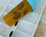 A picture of step 8 of Muskmelon Grapes Popsicles.