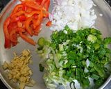 A picture of step 1 of Spring Onion & Red Capsicum Pasta.