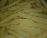 A picture of step 1 of Crispy masaledar finger chips.