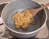A picture of step 3 of Quinoa and Cheese Egg Poppers.