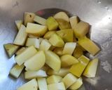 A picture of step 1 of Bitter Gourd Bhaji.