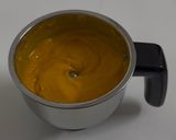 A picture of step 11 of Sunshine Bliss-No-Bake Mango Cheesecake.