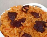 A picture of step 10 of Beetroot Jollof Rice.