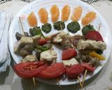 A picture of step 9 of Grilled Paneer mushrooms on Satay sticks.