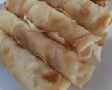 A picture of step 4 of Pancakes roll with cream.