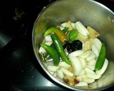 A picture of step 1 of Desi chicken curry.