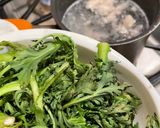 A picture of step 1 of Chrysanthemum Greens Soup and Stir-Fried Bok Choy with Mushrooms.