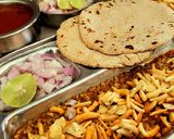 A picture of step 6 of Kolhapuri Misal Bhakri.