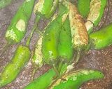 A picture of step 2 of Tali hui Hari mirchein.