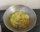 A picture of step 3 of Parwal dahi posto.