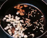 A picture of step 2 of Sattu Alsi Meva Ke Laddoo.
