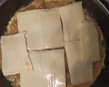 Foto del paso 6 de la receta: Tortilla de patata con jamón y queso y cebolla caramelizada