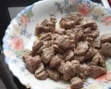 Foto del paso 4 de la receta Bocaditos de cerdo al ajillo con verduras a la soja