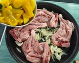 Foto del paso 10 de la receta Muslos de pollo con patatas en el pizzapan