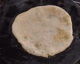 A picture of step 3 of Coconut stuffed parandaa.