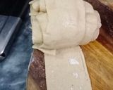A picture of step 5 of Roll paratha in desi ghee.