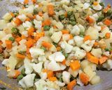 A picture of step 7 of Veg Hyderabadi Biryani with Boondi raita.