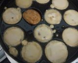 A picture of step 3 of Nei Paniyaram.