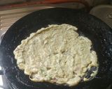 A picture of step 6 of Moong dal chilla.