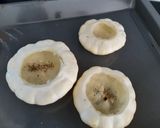 A picture of step 3 of Sausage meat stuffed patty pans.