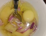 A picture of step 1 of Potato with egg n akra.