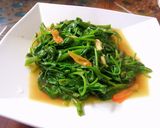 Foto langkah ke 6 dari resep Tumis kangkung hijau.