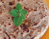 A picture of step 4 of Aalo stuff paratha.