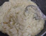 A picture of step 4 of Coconut Khoya Dry Fruit Fudge.