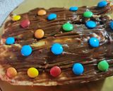 Foto del paso 7 de la receta: Pionono dulce con dulce de leche y chocolates confitados