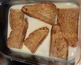 Foto del paso 6 de la receta: Torrijas al horno de miel, naranja y chocolate