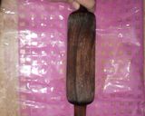 A picture of step 9 of Choco filled Biscuit Swiss Roll.