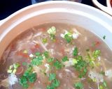 A picture of step 5 of Shangrila soup with bread sticks.