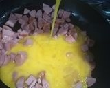 Foto del paso 4 de la receta: Huevo con salchichas