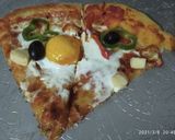 Une image de l'étape 5 de Pizza 🍕 aux 2 poivrons et œufs🥚.