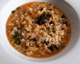Foto del paso 11 de la receta: Arroz caldoso de sepia, rape, setas y espinacas