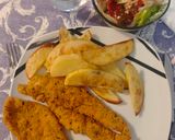Foto del paso 4 de la receta: Filetes de pollo empanados con patatas al horno