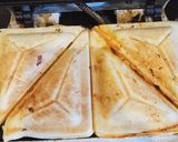 A picture of step 6 of Pizza sandwiches.