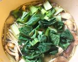 A picture of step 8 of Noodle soup with mushrooms and greens - vegan.