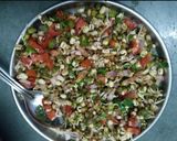 A picture of step 5 of Oats chila with sprouted beans topping.