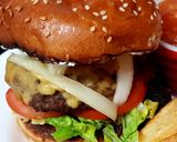 A picture of step 6 of My Chilli Burger with lots of toppings 😘.