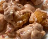 A picture of step 6 of Saucy Crispy chicken with rice fries and vegetable.