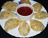 A picture of step 13 of Paneer Momo.