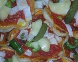 صورة لخطوة 3 من وصفة بيتزا الوردة بالعجينة المورقة 😋😋😋😋😋😋شحال بنييية