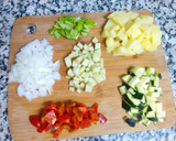 Foto del paso 4 de la receta: Pimientos rellenos de carne y verduras con 3 quesos