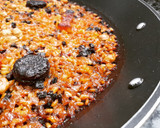 Foto del paso 6 de la receta: Arroz de butifarra negra, panceta y habitas